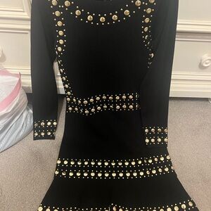 Elegant Black Dress with Gold Accents